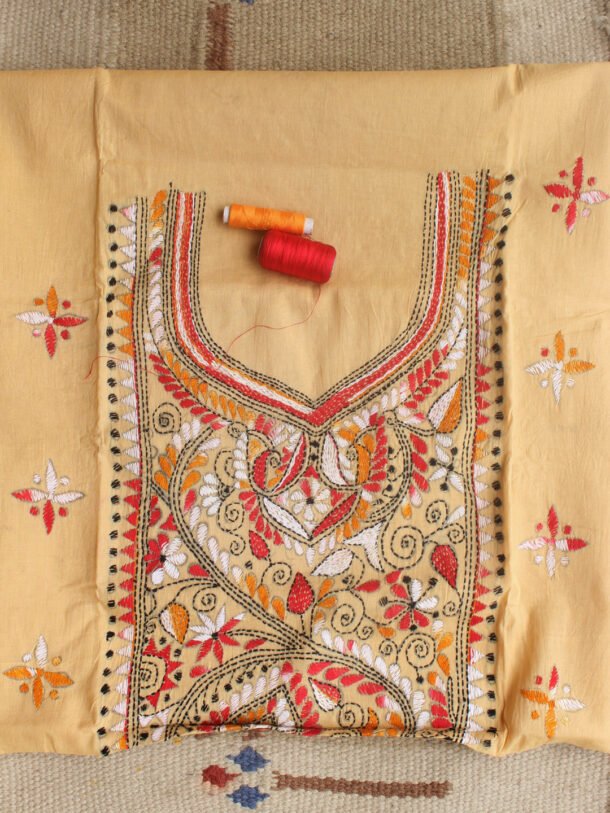 Red-and-white-kanthawork-on-beige-kurta-fabric