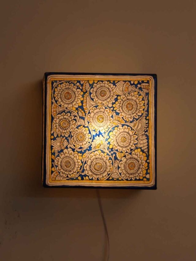 Blue-yellow-flowers-Tholu-bommalata-wall-lamp