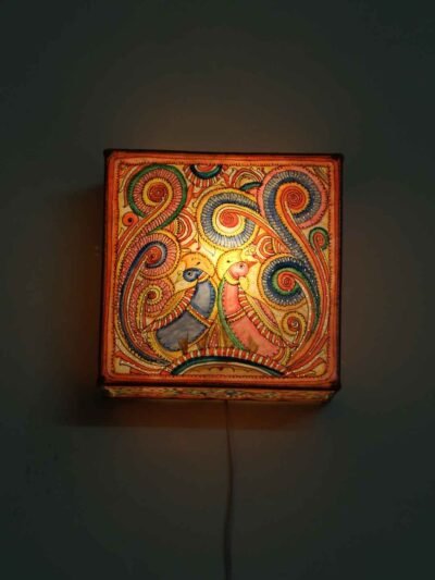 Two-peacocks-Tholu-Bommalata-Wall-Lamp