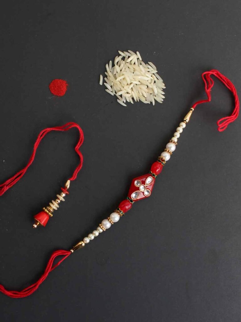 Red and White Bhaiya-Bhabhi Rakhi Pair – Shilphaat.com