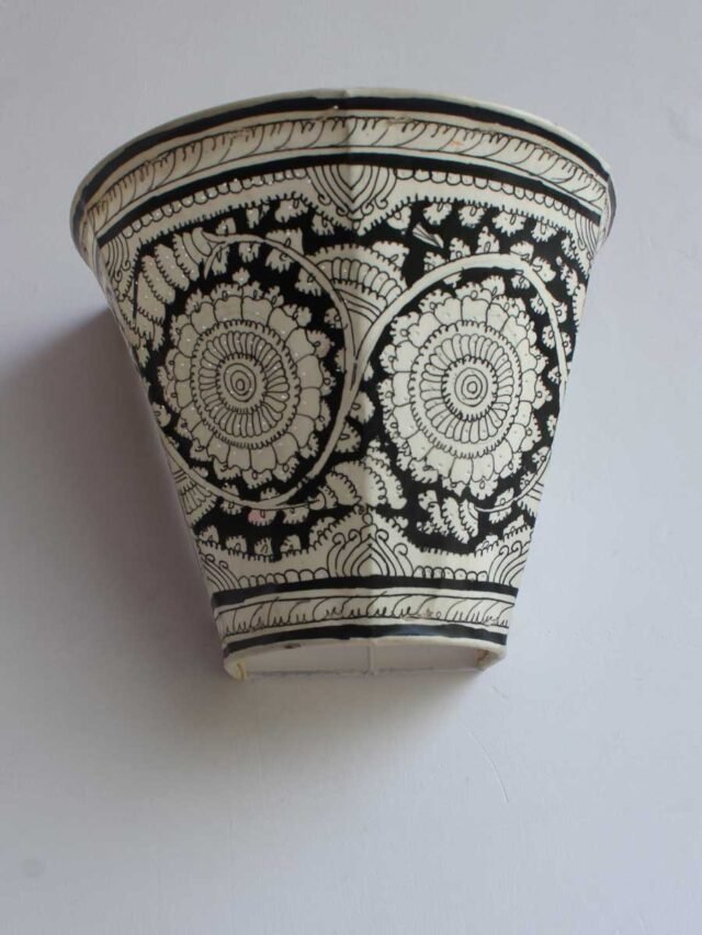 Black-and-white-leather-wall-lamp-by-Shilphaat
