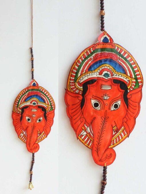 Orange-Ganesh-face-tholu-Bommalata-wall-hanging
