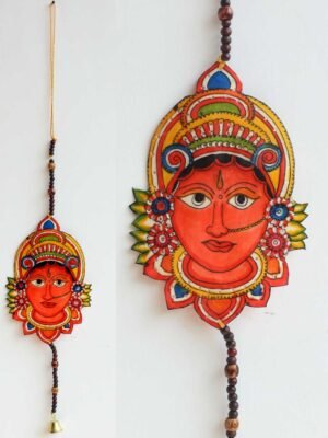 Orange-Goddess-face-tholu-Bommalata-wall-hanging