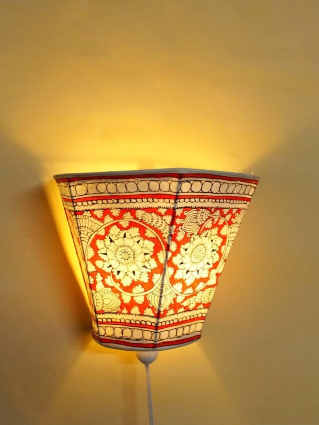 Floral-Red-Tholu-Bommalata-leather-wall-lamp at Shilphaat.com