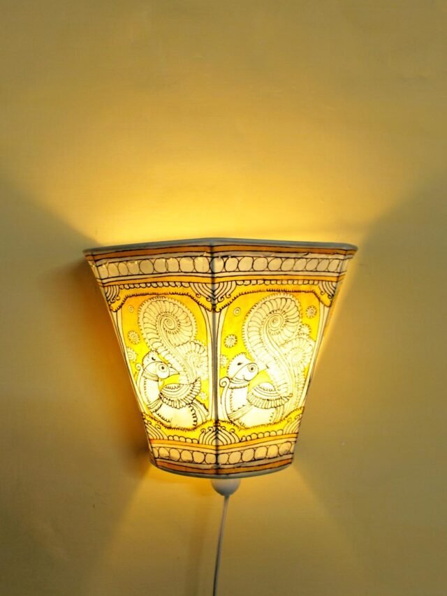 Yellow-peacocks-Tholu-Bommalata-wall-lamp at Shilphaat.com