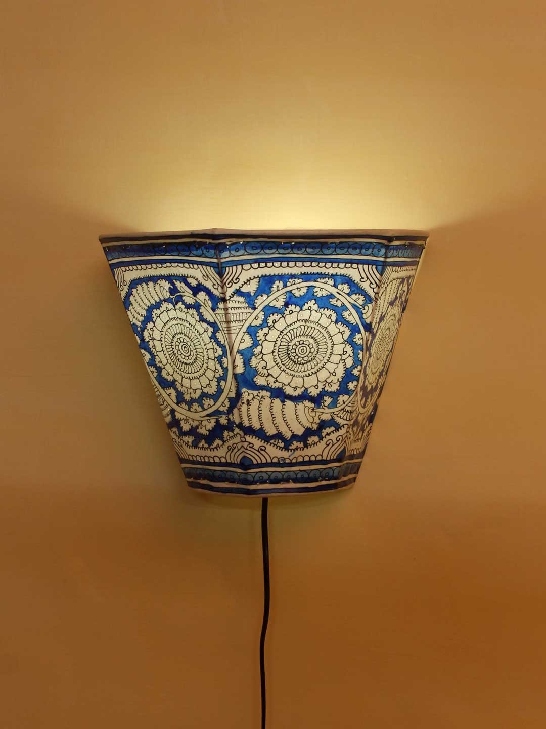 Blue-and-white-tholu-bommalata-wall-lamp.jpg White and Blue Tholu Bommalata Wall-lamp - Image 1