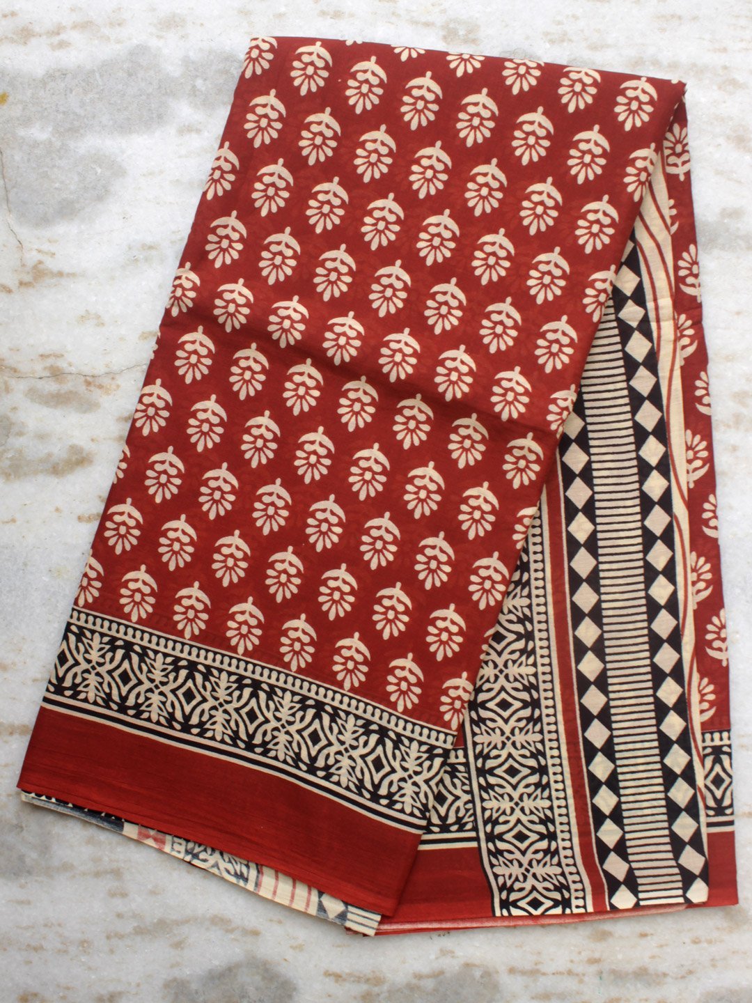 Brick-red-and-white-block-printed-mul-cotton-sari.jpg Brick-red and white Bagru-printed Mul-cotton Sari - Image 1