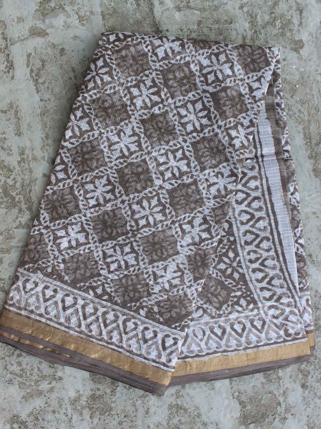 Dabu-printed-brown-grey-kota-cotton-saree.jpg Dabu-Printed Brown Grey Kota-cotton saree - Image 1