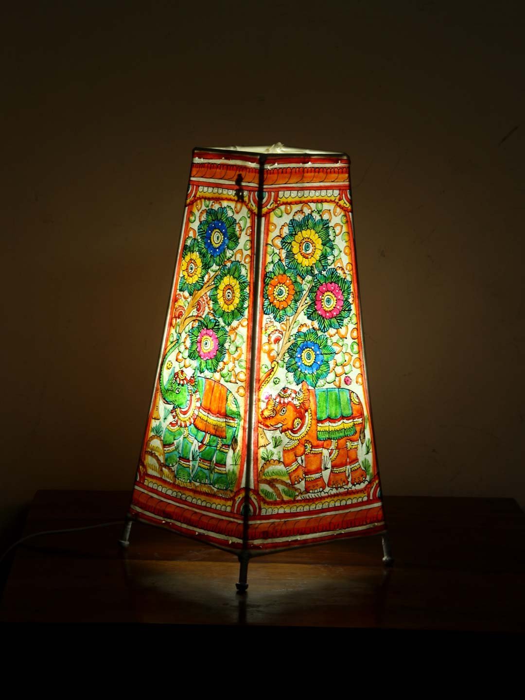 Elephants-long-leather-table-lamp-1.jpg Elephants, Tholu Bommalata Table lamp - Image 1