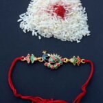 Enamelled Metallic Peacock Rakhi