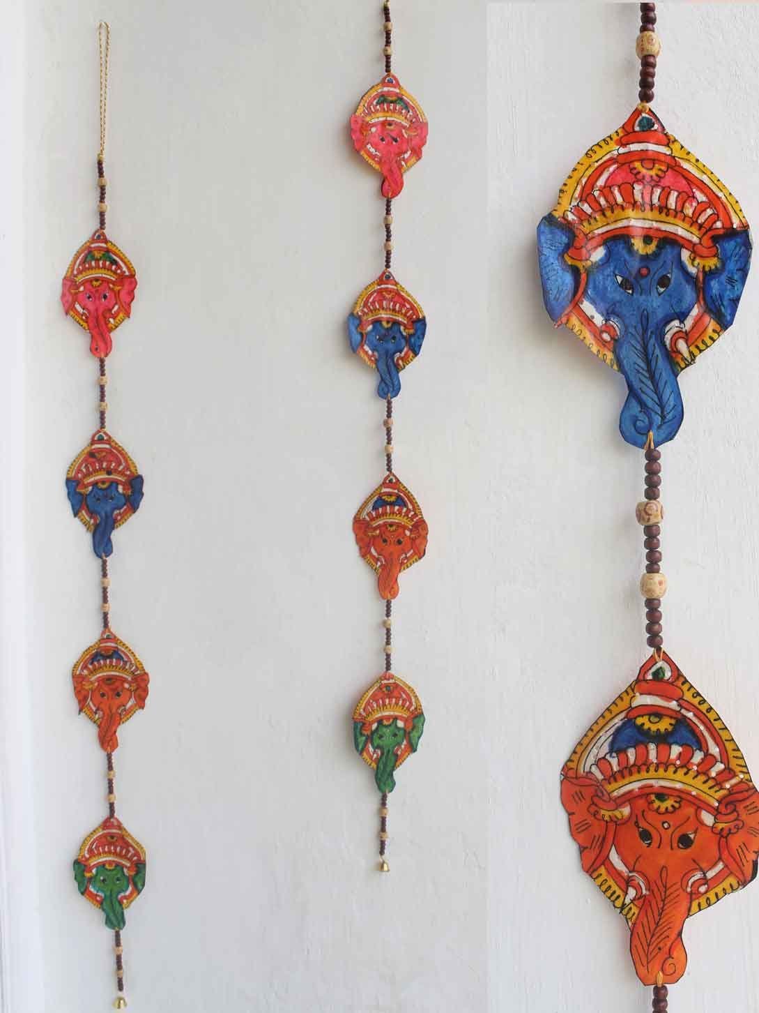 Ganesha-face-tholu-bommalata-toran.jpg Tholu-bommalata Ganesha face Toran - Image 1