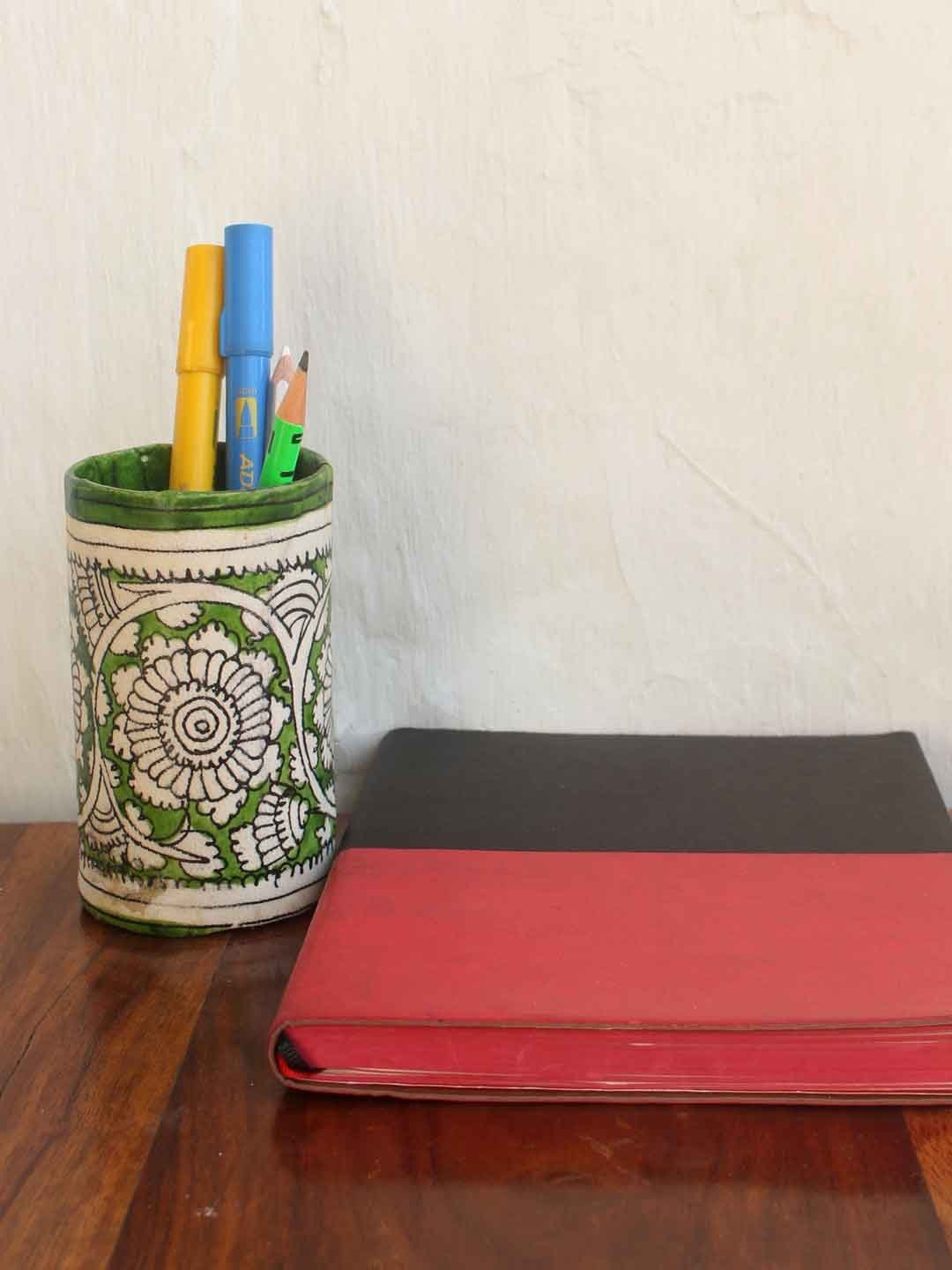 Green-white-Tholu-bommlata-pen-holder.jpg Green, White Tholu Bommalata Pen holder - Image 1