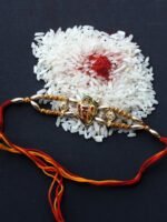 Small Metallic Ganesha on Om Rakhi