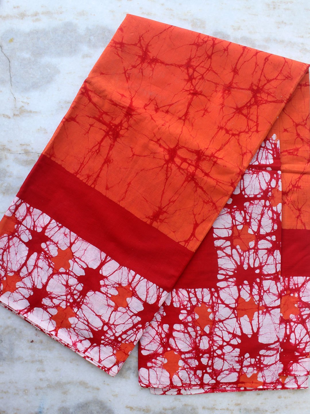Orange-and-red-batik-cotton-saree.jpg Orange, Red, White Mul-cotton Batik Sari - Image 1