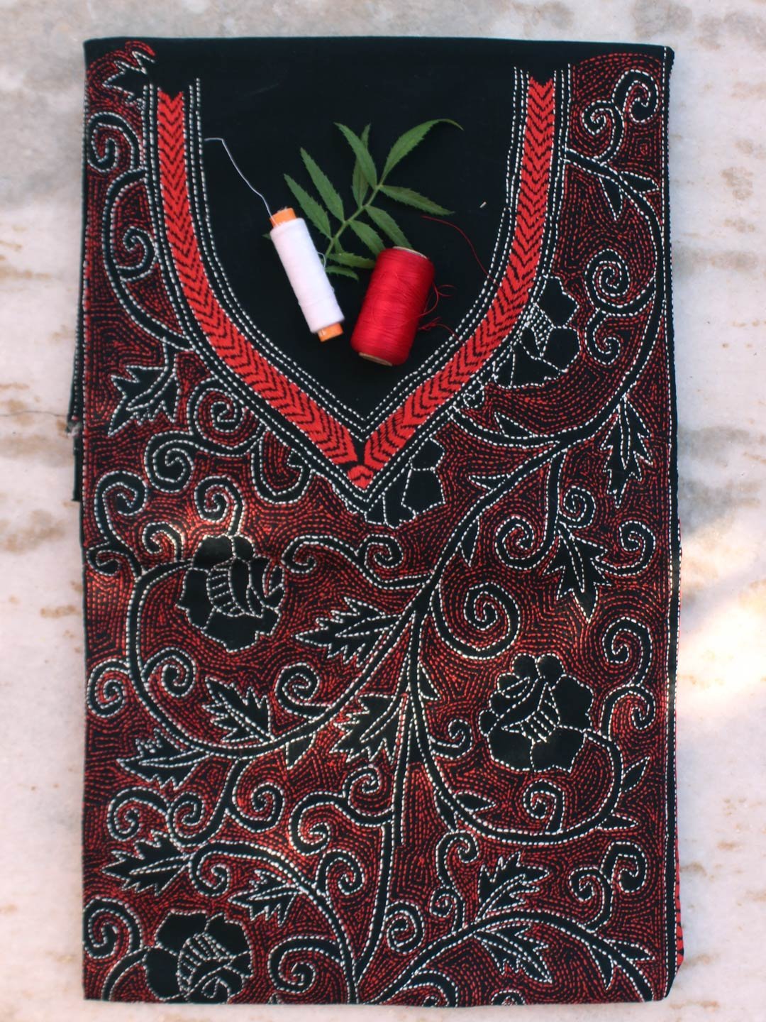 Orange-red-kanthawork-black-cotton-kurta-fabric.jpg Orange-Red reverse Kantha Black cotton kurta fabric - Image 1