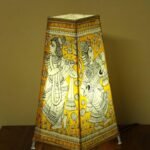 Yellow Krishna Tholu Bommalata Table Lamp