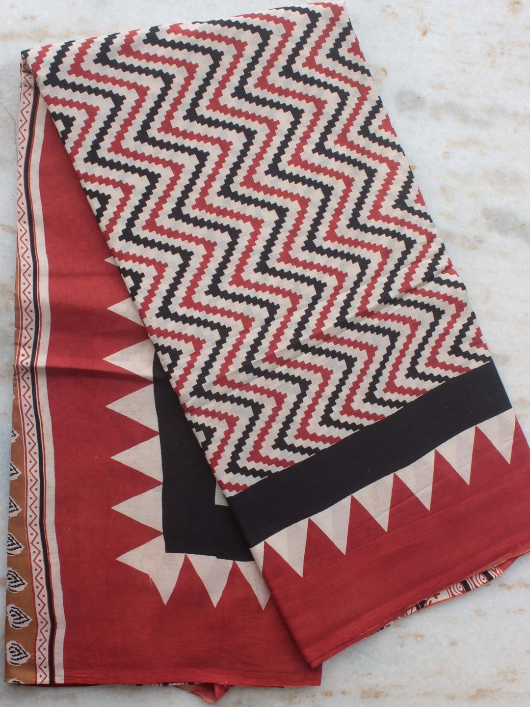 Red-and-black-zig-zag-block-printed-pure-cotton-saree.jpg Red and Black Zig-zag Block printed Mul-cotton sari - Image 1