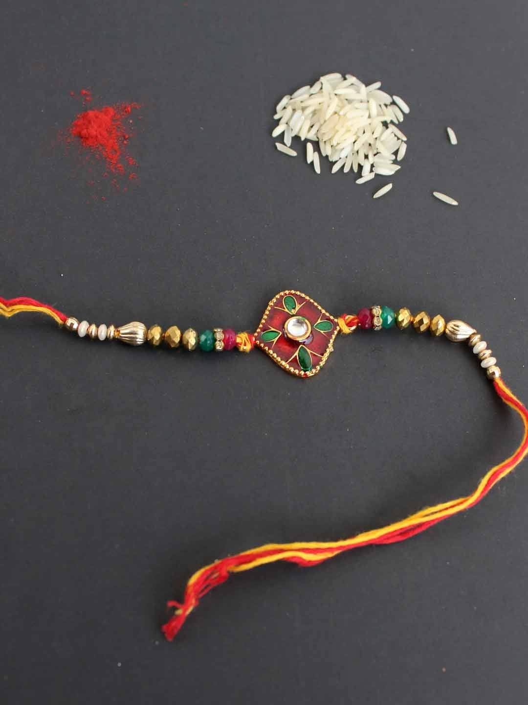 Red-green-Meenakari-Rakhi.jpg Red, Green Meenakari Rakhi - Image 1