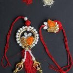 Red and orange zari Bhaiya-Bhabhi Rakhi