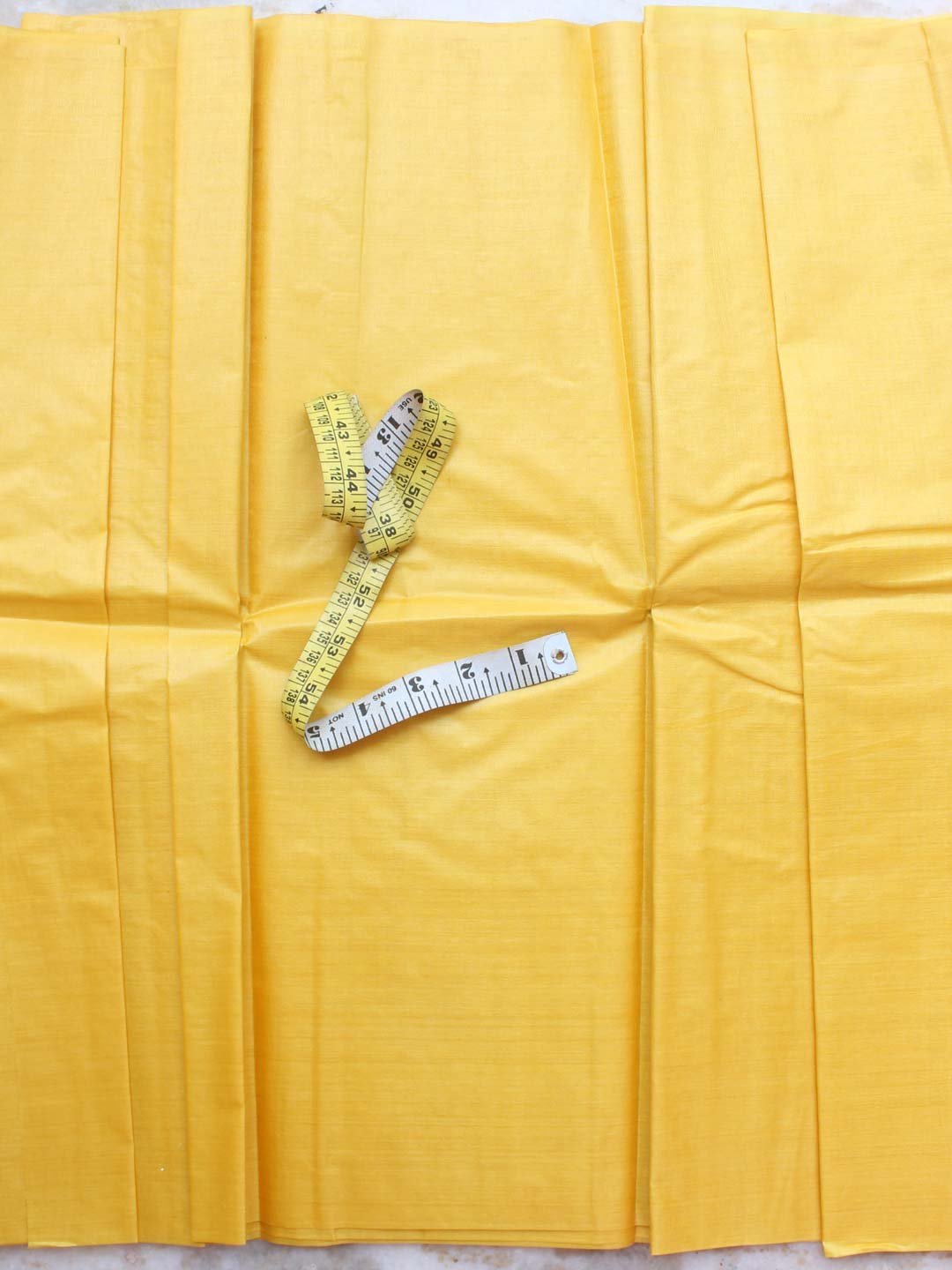 Sun-yellow-Bhagalpuri-paper-tussar-silk-Fabric.jpg Sun-yellow Paper tussar silk fabric - Image 1