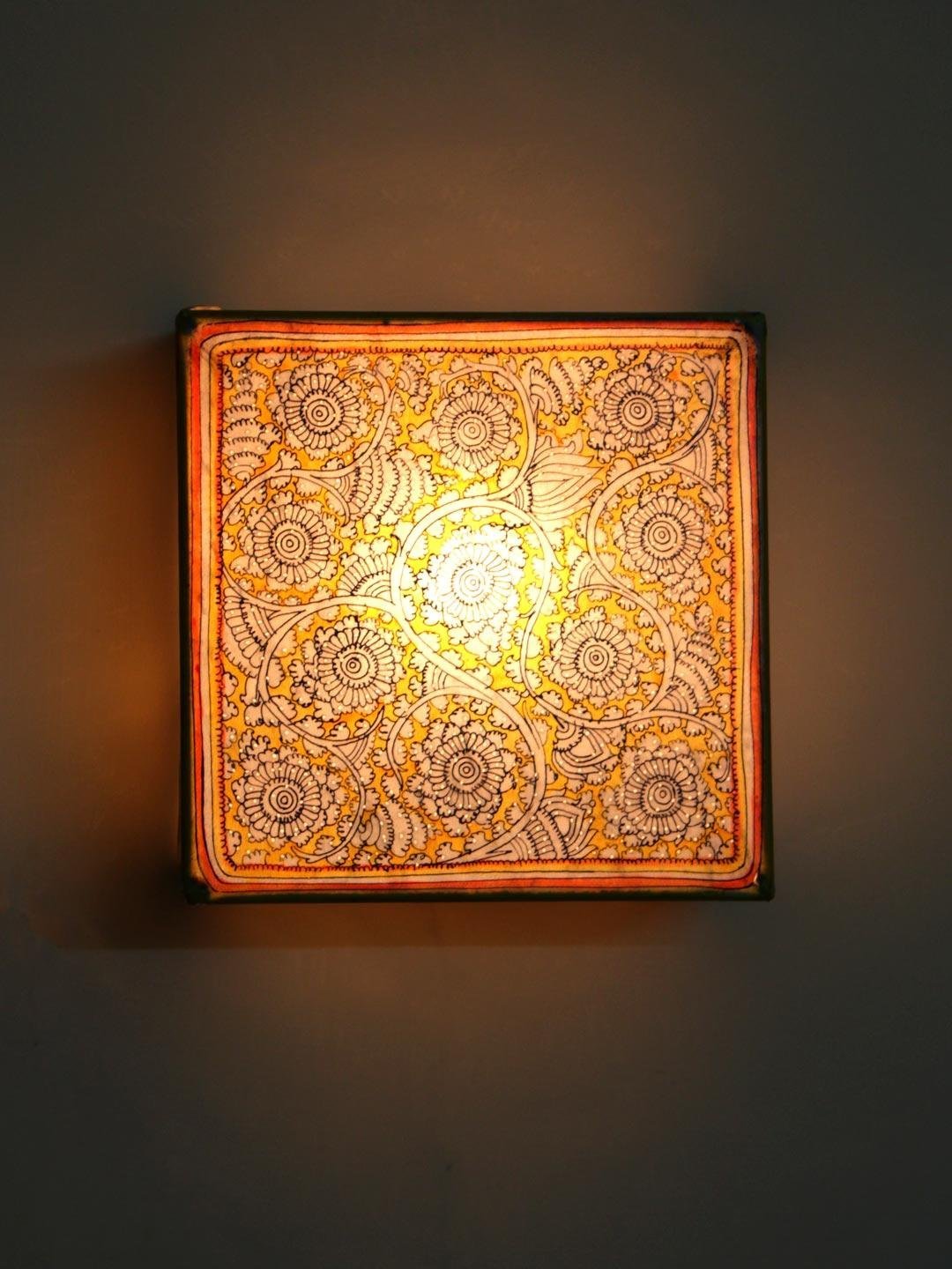 Yellow-flowers-tholu-bommalata-leather-wall-lamp-Shilphaat.jpg Yellow Flowers Tholu Bommalata Wall-Lamp - Image 1