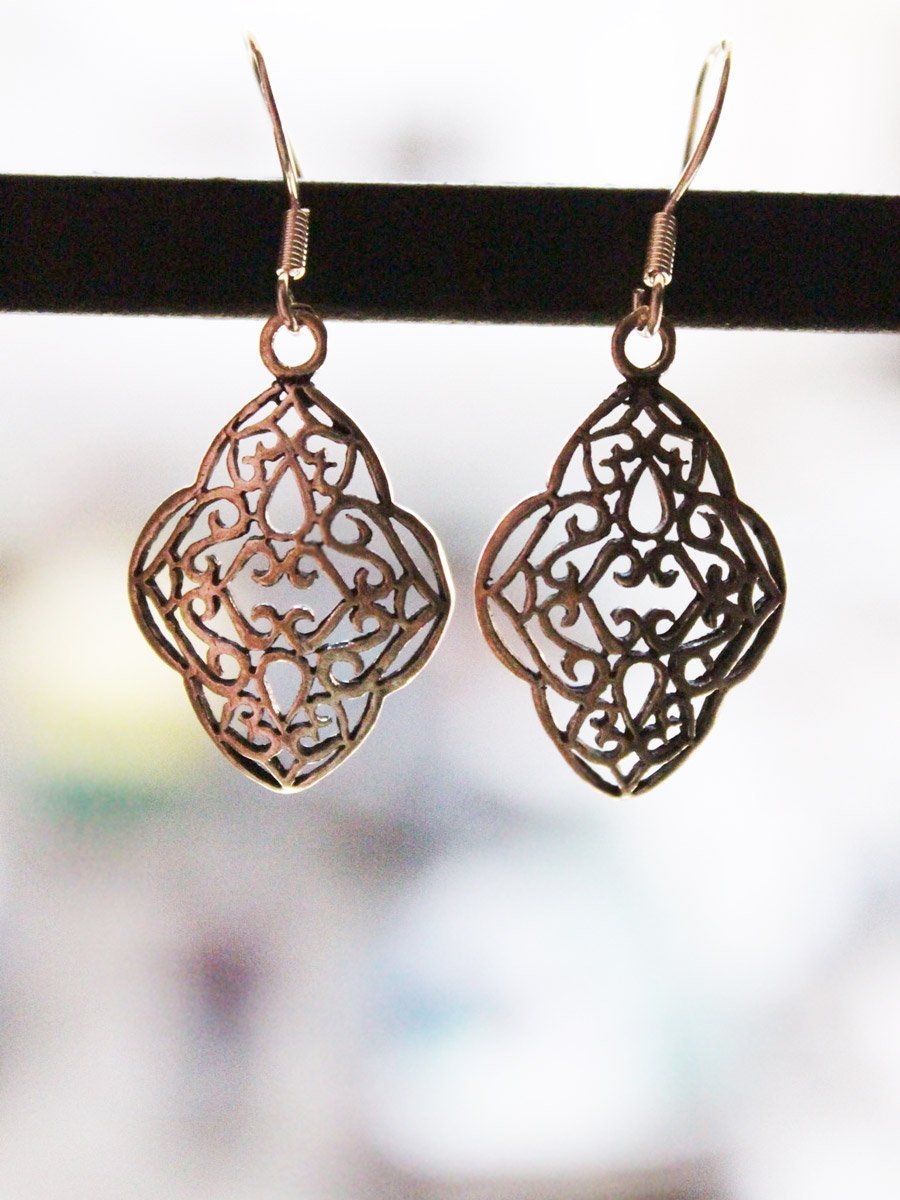 filigree-rounded-rhombus-shapejpg.jpg Handcarved rhomboid Silver Earrings - Image 1