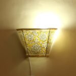 Yellow flowers, Tholu Bommalata small wall-lamp