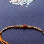 Yellow thread Rudraksha Rakhi