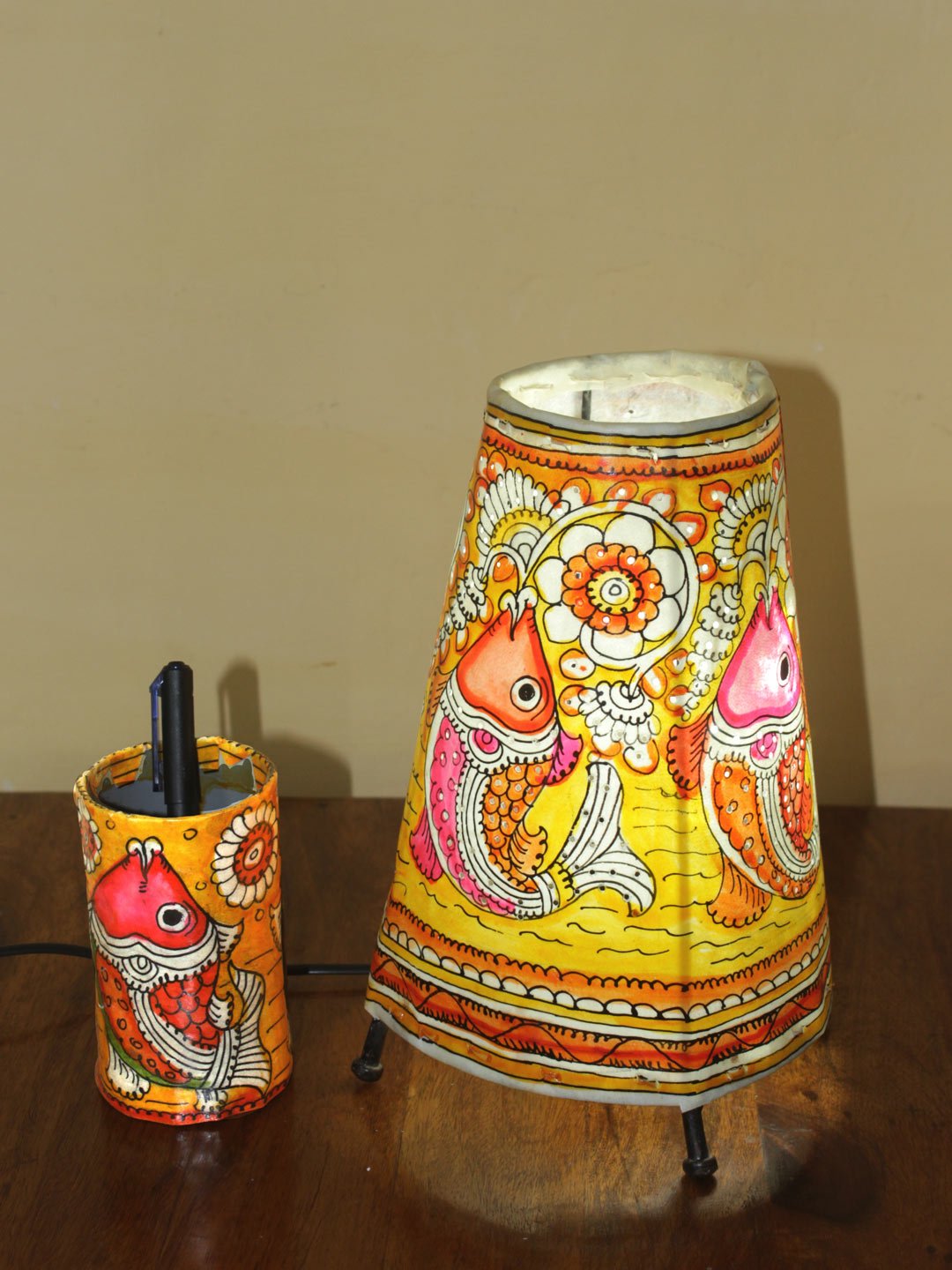 Yellow-fishes-Tholu-Bommalata-lamp-pens-stand-set-Shilphaat Yellow-fishes-Tholu-Bommalata-lamp-pens-stand-set-Shilphaat