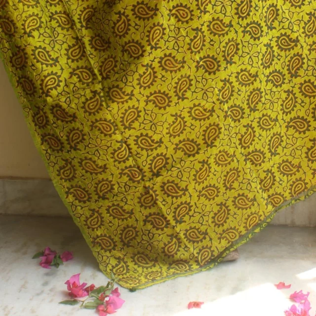 Dark-Green Block Print on olive-green Silk Duppata, handembroidered with red and yellow kantha-work.
.
KanthaWork handembroidery on block printed Banglore Silk. Use it as dupatta/ wrap or get it stitched to a statement dress. We leave it to your imagination.
.
Shop online at www.shilphaat.com
Category: Dupatta
Sub-category: Kanthawork
.
#tussarsilk #tassar #silk #kantha #blockprint #kanthawork #Dupatta #sustainablefashion #silkscarf #festiveshopping #durgapuja #embroidery #handembroidery #slowfashion #instalike #handmade #indianart #shoponline #Shilphaat